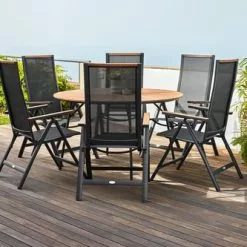 JUTLANDIA RANGSTRUP Ø130 Bord Natur + 4 BREDSTEN Stol Svart -Sovrum Rea 178507