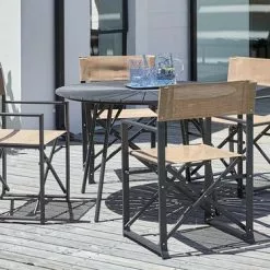 JUTLANDIA RANGSTRUP Ø110 Bord Svart + 4 NAGELSTI Stol Svart